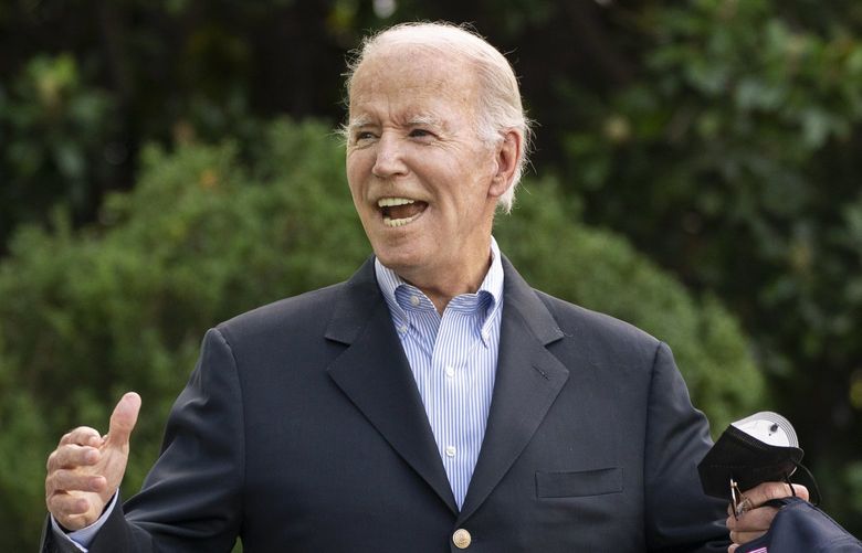President Joe Biden responds to reporters questions as he walks to board Marine One on the South Lawn of the White House in Washington, on his way to his Rehoboth Beach, Del., home after his most recent COVID-19 isolation, Sunday, Aug. 7, 2022. (AP Photo/Manuel Balce Ceneta) OTKMC112 OTKMC112