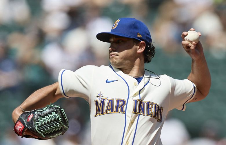 Seattle Mariners starting pitcher Marco Gonzales works against the Los Angeles Angels during the first inning of a baseball game, Sunday, Aug. 7, 2022, in Seattle. (AP Photo/John Froschauer) WAJF102 WAJF102