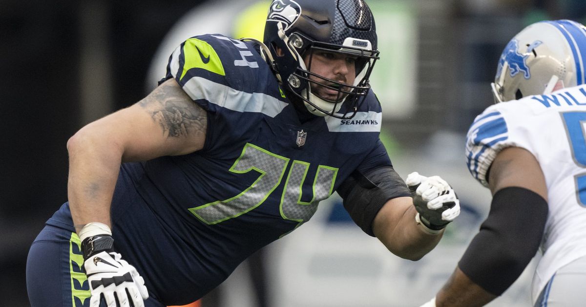 Seattle Seahawks offensive tackle Jake Curhan (74) goes for a block during  an NFL pre-season football game against the Minnesota Vikings, Thursday,  Aug. 10, 2023 in Seattle. (AP Photo/Ben VanHouten Stock Photo 