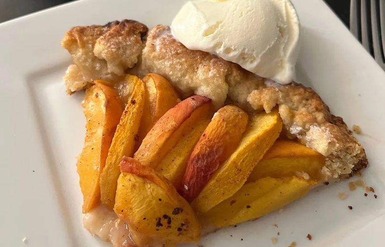 FOR TZR ONLY A free-form peach crostata is easier to make than pie, but just as sweet of a taste of summer. (Gretchen McKay/Pittsburgh Post-Gazette/TNS)