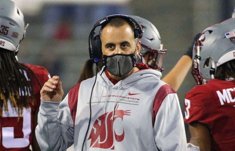 Washington State head coach Nick Rolovich looks on during the second half of an NCAA college football game against Utah State, Saturday, Sept. 4, 2021, in Pullman, Wash. (AP Photo/Young Kwak) OTK OTK