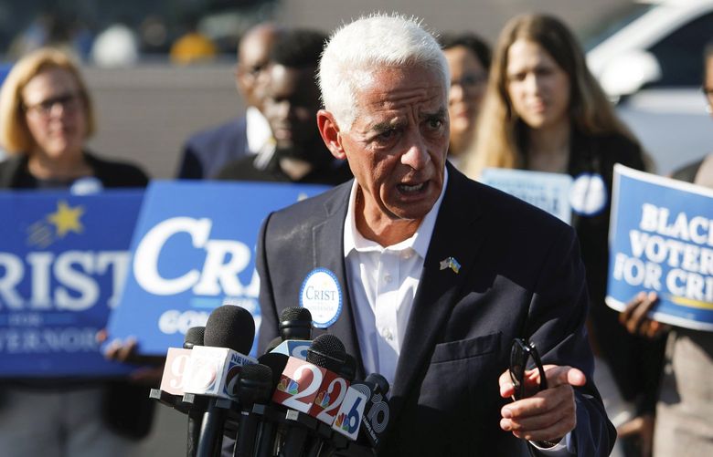 U.S. Rep. Charlie Crist speaks to the media at Kissin’ Cuzzins on Wednesday, Aug. 24, 2022, in St. Petersburg, Fla. Crist won the Democratic nomination for governor in Florida, putting him in a position to challenge Gov. Ron DeSantis this fall. (Jefferee Woo/Tampa Bay Times via AP) FLPET502 FLPET502