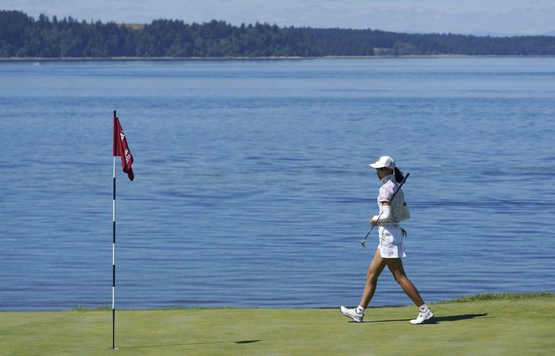 Saki Baba, of Japan, walks on the 16th green, Sunday, Aug. 14, 2022, during the final round of the USGA Women’s Amateur Golf Championship at Chambers Bay in University Place, Wash. (AP Photo/Ted S. Warren) WATW150 WATW150