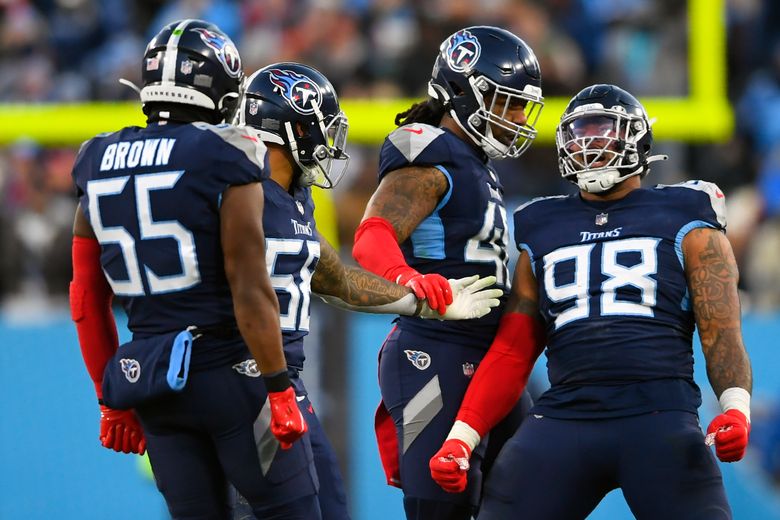 Harold Landry of the Tennessee Titans celebrates after a play