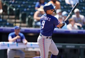 Perez, Lowe, big 2nd inning help Rangers rout Rockies 16-4