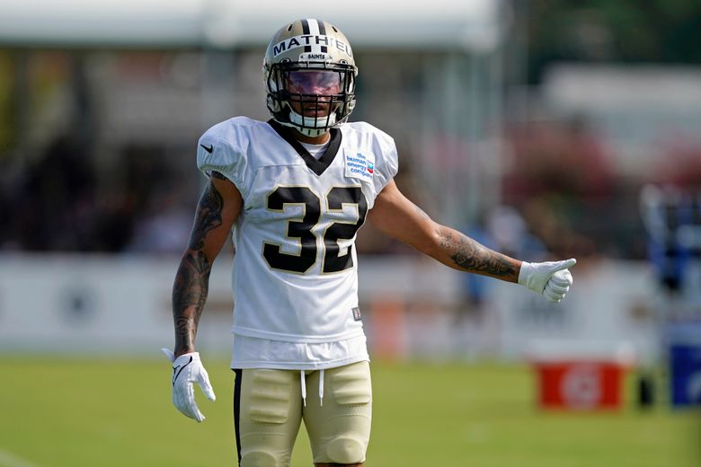 New Orleans Saints safety Tyrann Mathieu (32) walks between drills during training camp at their NFL football training facility in Metairie, La., Thursday, Aug. 4, 2022. (AP Photo/Gerald Herbert)