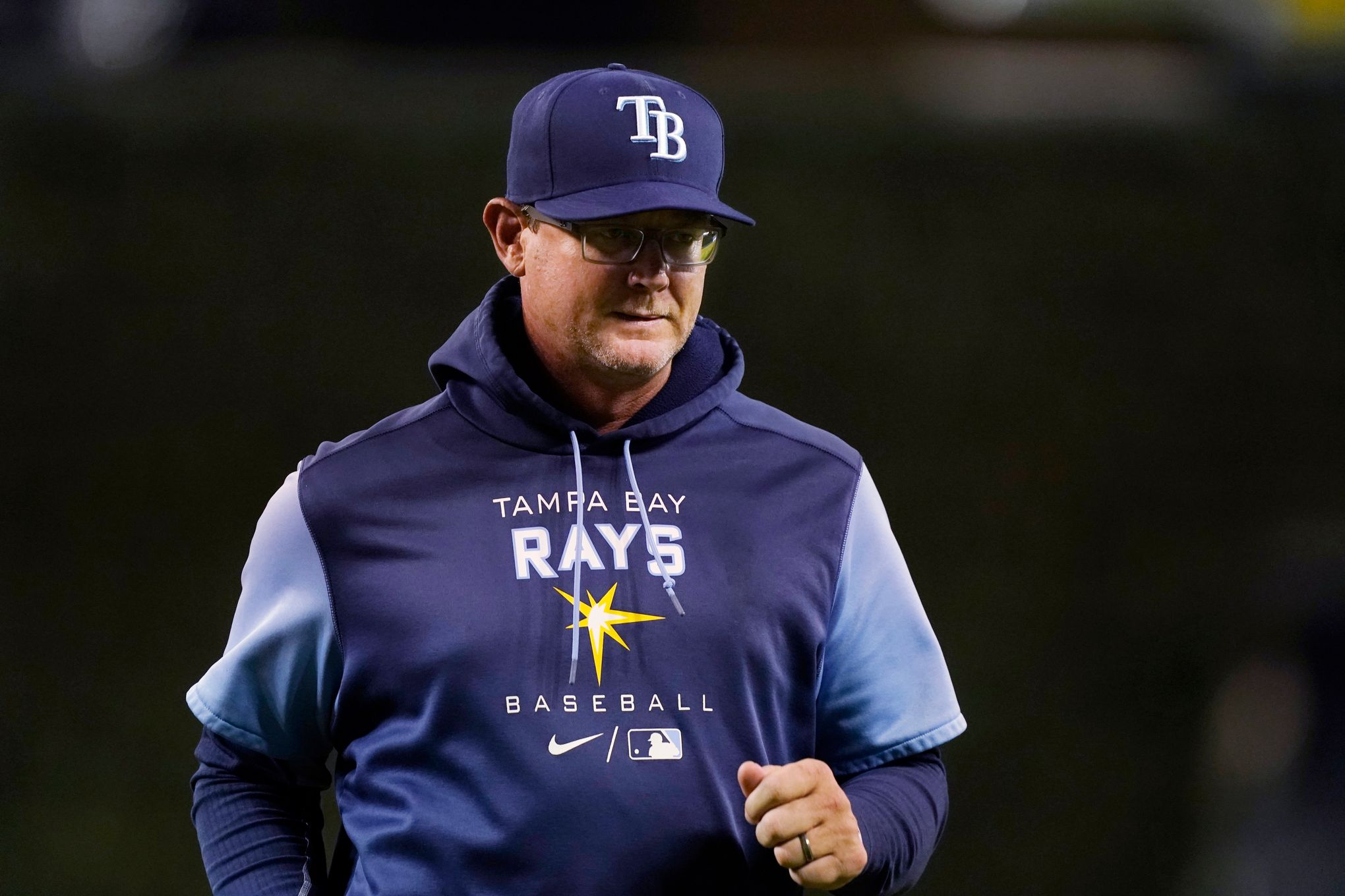 Tampa Bay Rays pitching coach Kyle Snyder, left, looks on as Shane  McClanahan holds his all-star jersey before a baseball game against the  Baltimore Orioles Saturday, July 16, 2022, in St. Petersburg