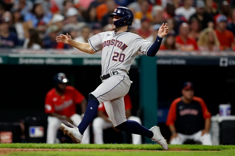 Houston Astros center fielder Chas McCormick can't make the catch