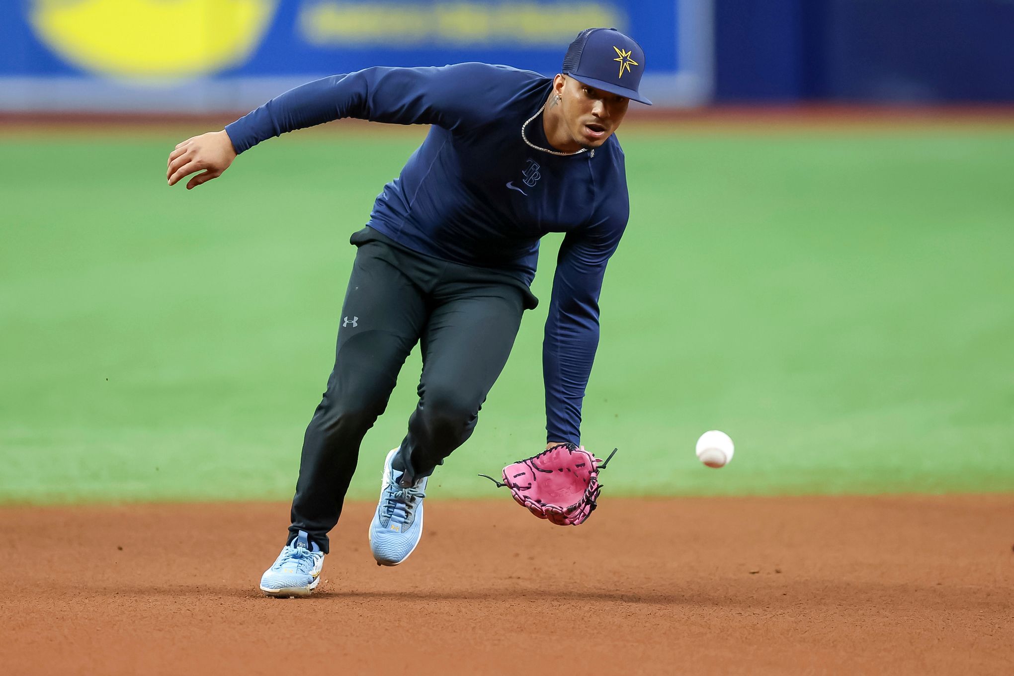 Tampa Bay Rays shortstop Wander Franco fields a ground ball out