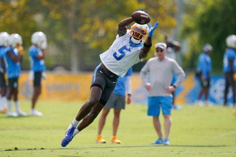 Jul 26, 2023; Costa Mesa, CA, USA; Los Angeles Chargers receiver Joshua Palmer (5) catches the ball during training camp at Jack Hammett Sports Complex. Mandatory Credit: Kirby Lee-USA TODAY Sports (Green Bay Packers)