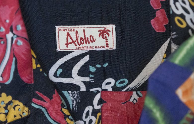 Label in one of the shirts that David Bader, a collector and designer of Aloha shirts, has made.  shot Friday, July 29, 2022.  221053