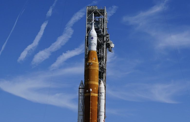 The NASA moon rocket stands on Pad 39B before the Artemis 1 mission to orbit the moon at the Kennedy Space Center, Thursday, Sept. 1, 2022, in Cape Canaveral, Fla. (AP Photo/Brynn Anderson)