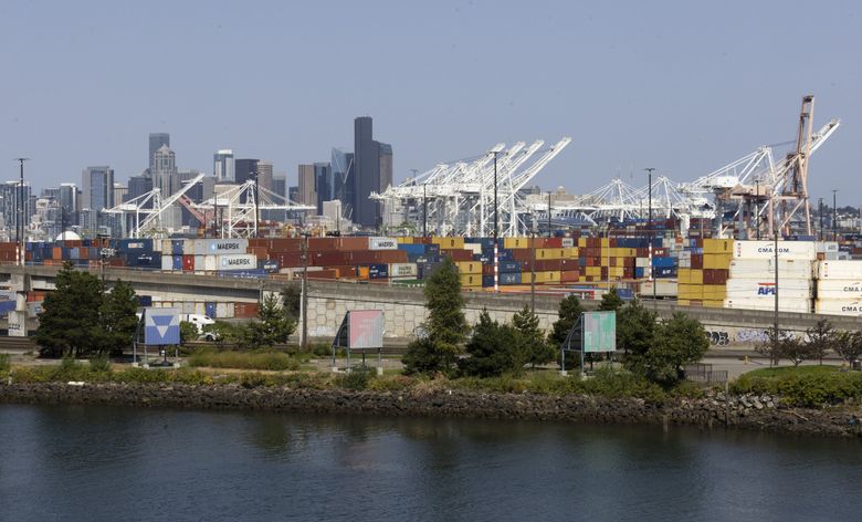Around 15 international shipping companies call at Terminal 18 in the mouth of the Duwamish River, including Maersk, Hamburg Sud and CMA CGM. (Ellen M. Banner / The Seattle Times)