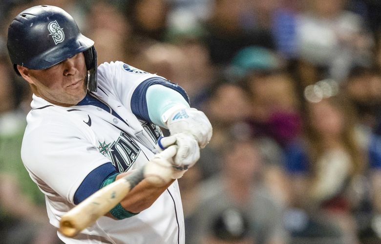 Seattle Mariners’ Ty France hits a double off Chicago White Sox starting pitcher Johnny Cueto during the fourth inning of a baseball game, Tuesday, Sept. 6, 2022, in Seattle. (AP Photo/Stephen Brashear) WASB104