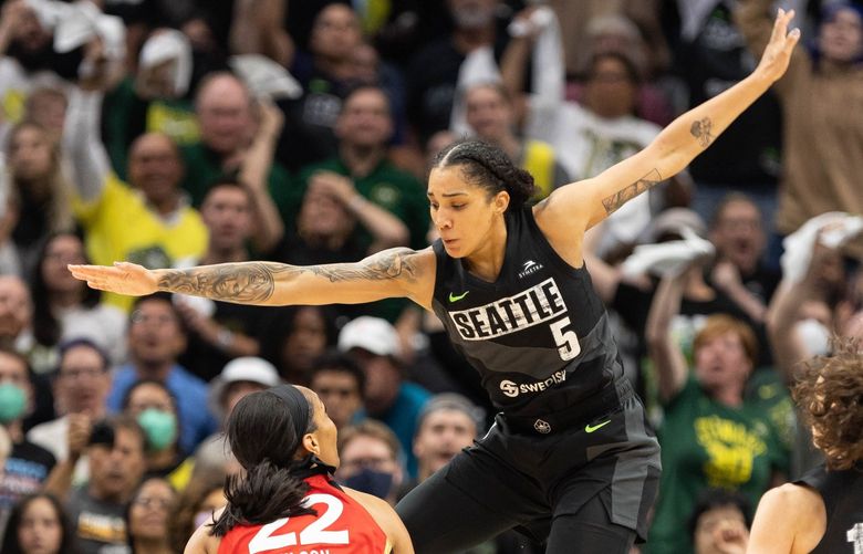 Seattle’s Gabby Williams puts the defensive press on Las Vegas’ A’ja Wilson in the lane in the second quarter. 221512