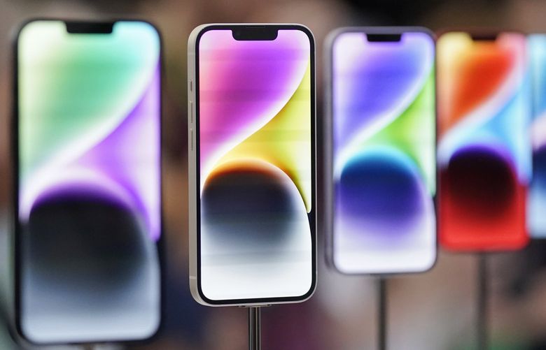 New iPhone 14 models on display at an Apple event on the campus of Apple’s headquarters in Cupertino, Calif., Wednesday, Sept. 7, 2022. (AP Photo/Jeff Chiu)