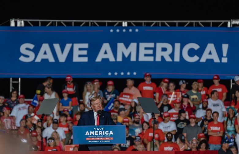 FILE – Donald Trump speaks under a “Save America!” Banner at a rally in Waukesha, Wis., Aug. 5, 2022. A federal grand jury in Washington is examining the formation of – and spending by – The Save America PAC created by Trump after his loss in the 2020 election. (Jamie Kelter Davis/The New York Times) XNYT46 XNYT46