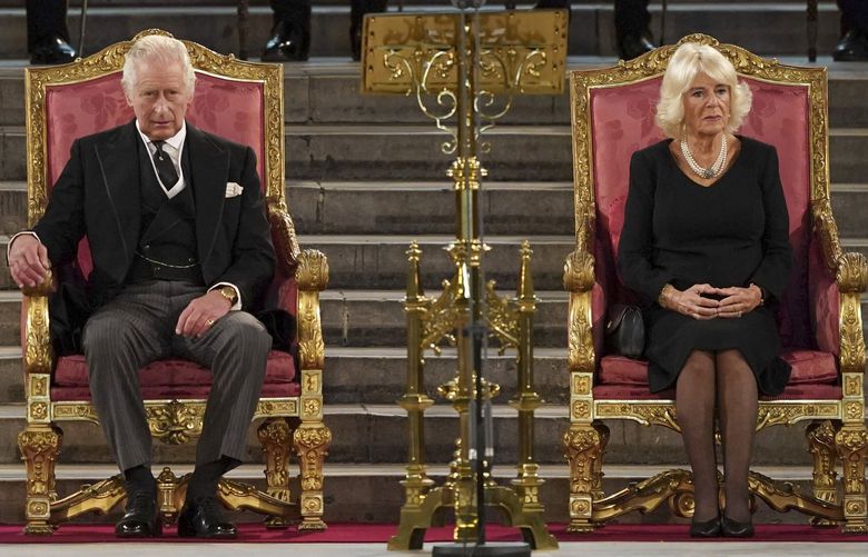 Britain’s King Charles III, left, and Camilla, the Queen Consort sit at Westminster Hall, where both Houses of Parliament are meeting to express their condolences following the death of Queen Elizabeth II, at Westminster Hall, in London, Monday, Sept. 12, 2022. Queen Elizabeth II, Britain’s longest-reigning monarch, died Thursday after 70 years on the throne. (Stefan Rousseau/Pool Photo via AP) LBL105 LBL105