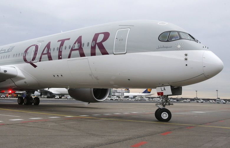 FILE – In this Jan. 15, 2015, file photo, a new Qatar Airways Airbus A350 approaches the gate at the airport in Frankfurt, Germany.   American Airlines and Qatar Airways said Tuesday, Feb. 25, 2020,  they will put aside past hostilities and revive a partnership selling seats on some of each otherâ€™s flights and splitting the revenue. American says it hopes that the arrangement will boost its ability to sell travel to India and elsewhere in Asia and also to Africa â€” weak spots in its current network. (AP Photo/Michael Probst, File)