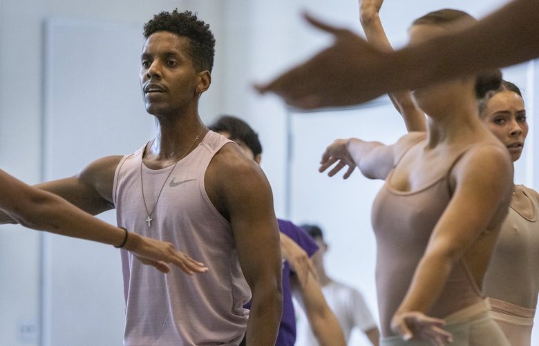 Jonathan Batista, (c) a soloist with the Pacific Northwest Ballet, dances during a rehearsal for “Allegro Brillante,†Friday, September 9, 2022.
Pacific Northwest Ballet, celebrating its 50th anniversary, is evolving. In addition to its foundation in classical ballet traditions, it’s gained significant strengths in contemporary dance. 221534