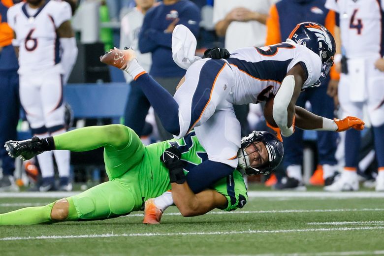 Denver Broncos running back Javonte Williams (33) during an NFL football  game against the Seattle Seahawks, Monday, Sept. 12, 2022, in Seattle, WA.  The Seahawks defeated the Bears 17-16. (AP Photo/Ben VanHouten