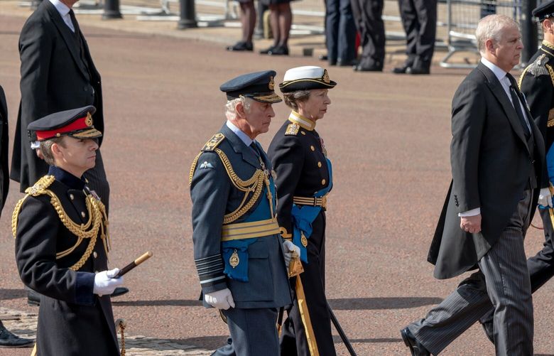 King Charles III, center left; his sister, Princess Anne, center; and his brother, Prince Andrew, right, walk behind the coffin of their mother, Queen Elizabeth II, in London on Wednesday, Sept. 14, 2022. Often appearing at more than 400 events a year, Anne is likely to become even more central as a trusted adviser to her brother, the king. (Andrew Testa/The New York Times) XNYT239 XNYT239