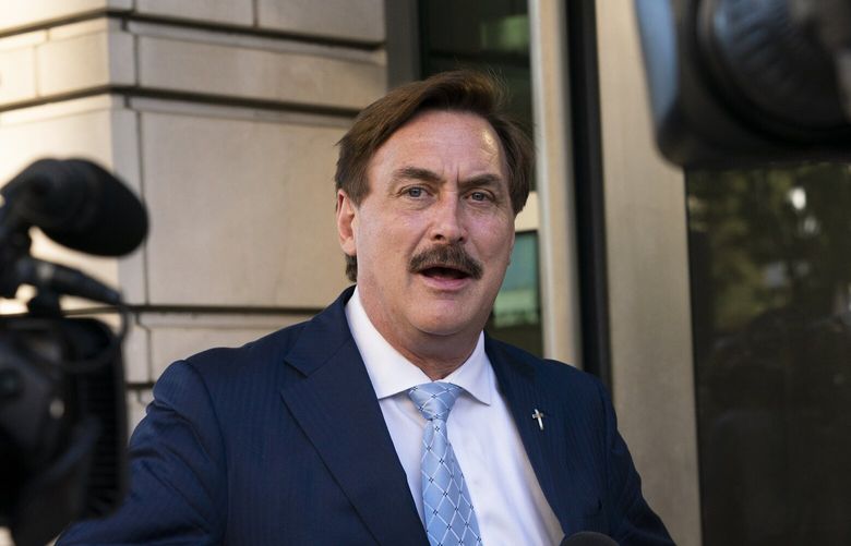 FILE – MyPillow chief executive Mike Lindell speaks to reporters outside federal court in Washington, Thursday, June 24, 2021. On Tuesday, Sept. 13, 2022, Lindell said that federal agents seized his cellphone and questioned him about a Colorado clerk who has been charged in what prosecutors say was a â€œdeceptive schemeâ€ to breach voting system technology used across the country. (AP Photo/Manuel Balce Ceneta, File) NYSB263 NYSB263