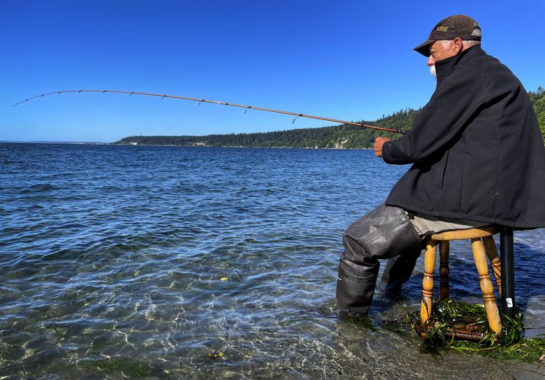 At Bush Point, anglers spend a sunny day seeking hatchery coho salmon