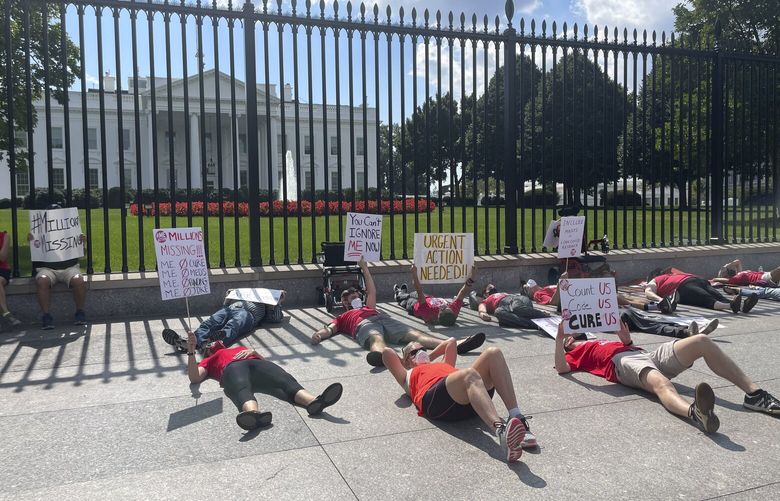 A protest demanding action on chronic fatigue syndrome and long COVID-19 in front of the White House, Washington, on Sept 19, 2022. Biden said the pandemic is over in an interview that aired on CBS’s “60 Minutes” on Sunday, Sept. 18, 2022; by Monday, the backlash was in full swing. (Zeynep Tufekci/The New York Times) XNYT223 XNYT223