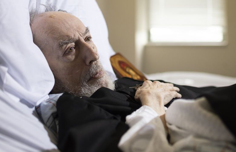Brother Victor-Antoine d’Avila-Latourrette, a Benedictine monk and cookbook author, lies in his bed at Ferncliff Nursing Home in Rhinebeck, N.Y. MUST CREDIT: Photo by Angus Mordant for The Washington Post.