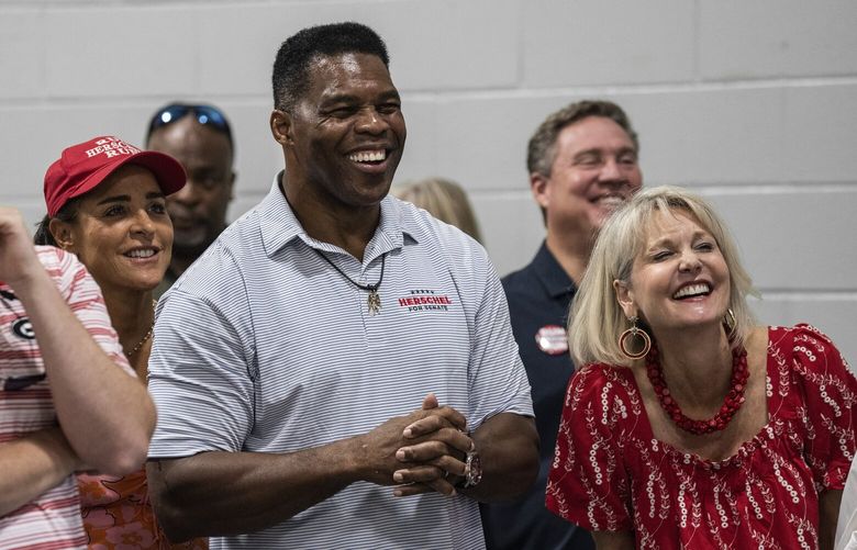 FILE – Herschel Walker, the former football star and Republican candidate for Senate, at an event hosted by the Georgia Republican Party in Perry, Ga. on Aug. 27, 2022. Walker has long claimed his food business donated profits to charities, but there is scant evidence that it has delivered on his promises. (Haiyun Jiang/The New York Times) XNYT46 XNYT46