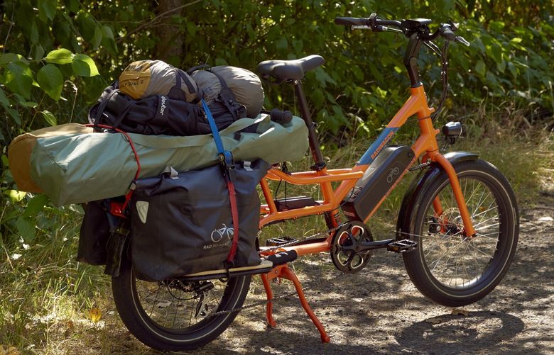 The RadWagon 4, in Seattle, on July 26, 2020, the latest model from Rad Power Bikes, extends the cargo-style frame to accommodate a long list of accessories. Mike Radenbaugh dreamed up Rad Power Bikes over a decade ago in his family’s garage and now sets the pace for affordable battery-propelled bicycles. (Meron Tekie Menghistab/The New York Times)
