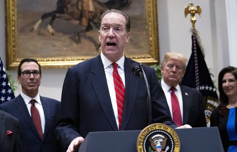 FILE – David Malpass speaks as he is introduced by then-President Donald Trump, second from right, as his pick to lead the World Bank at the White House on Feb. 6, 2019. Malpass touched off a furor, including calls for his removal, when he refused to acknowledge that fossil fuels are warming the planet. (Doug Mills/The New York Times) XNYT64 XNYT64