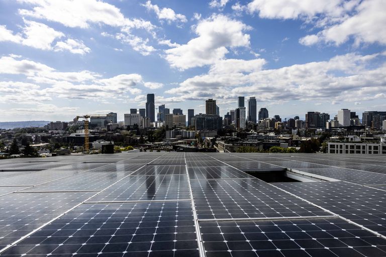 Solar panels absorb energy from the sun atop the Bullitt Center in Seattle