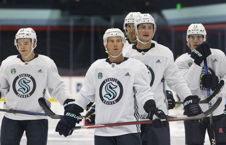 Seattle Kraken players including Jaden Schwartz (center) participate in drills during the first day of training camp at the Kraken Community Iceplex in Seattle, WA on September 22, 2022. 221587