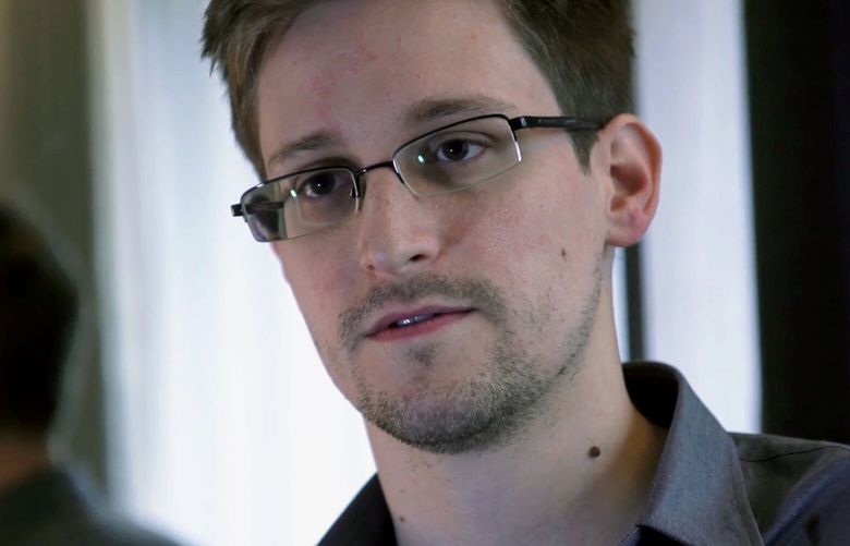 FILE – A Sunday, June 9, 2013, file photo provided by The Guardian newspaper in London shows Edward Snowden, who worked as a contract employee at the U.S. National Security Agency, in Hong Kong. A report that revealed the massive U.S. government surveillance effort is among the top finalists for the Pulitzer Prize. The stories were based on thousands of documents handed over by Snowden. The reports were published by Barton Gellman of The Washington Post and Glenn Greenwald, Laura Poitras and Ewan MacAskill of The Guardian. (AP Photo/The Guardian, File) NY109