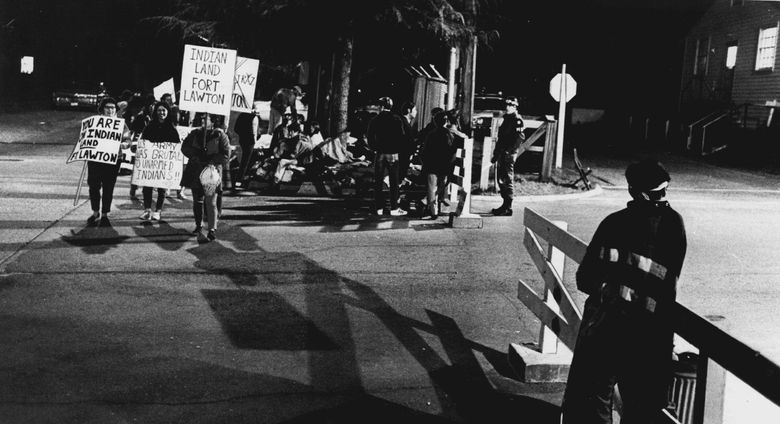 March 11, 1970: &#8220;Indians picketed at 8 p.m. yesterday outside the main gate at Fort Lawton, continuing their demand that the 1,100 surplus acres at the fort be given back to the Indians for a cultural center and college. The demonstration began at noon yesterday. Military police were lined on one side of the gate and Indians on the other. No attempts were made to enter &#8230;&#8221; (Greg Gilbert / The Seattle Times)