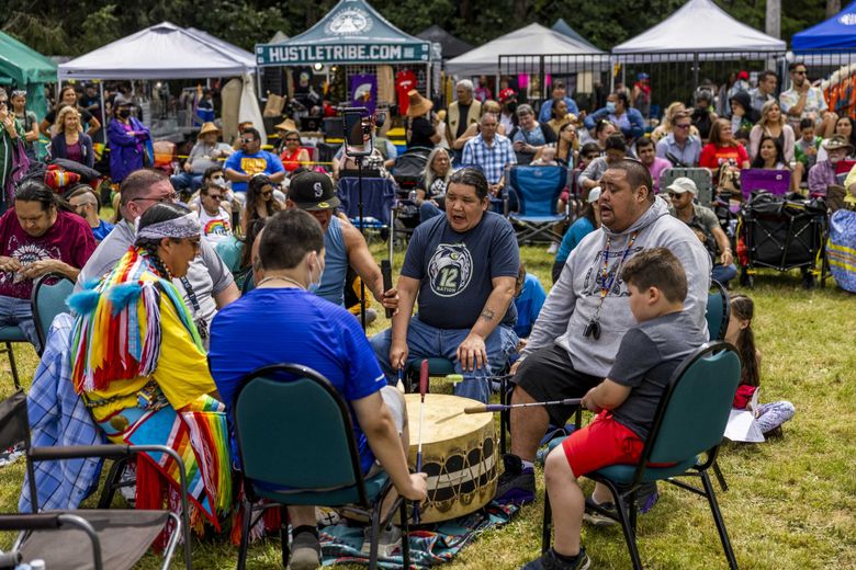 206, an intertribal drumming group, performs in July at the 33rd annual Seafair Indian Days Powwow at Daybreak Star Indian Cultural Center. In 1970, Native American activists staged a series of protests at Fort Lawton in Seattle. Those protests birthed the nonprofit United Indians of All Nations, and its headquarters at Daybreak Star. (Daniel Kim / The Seattle Times)