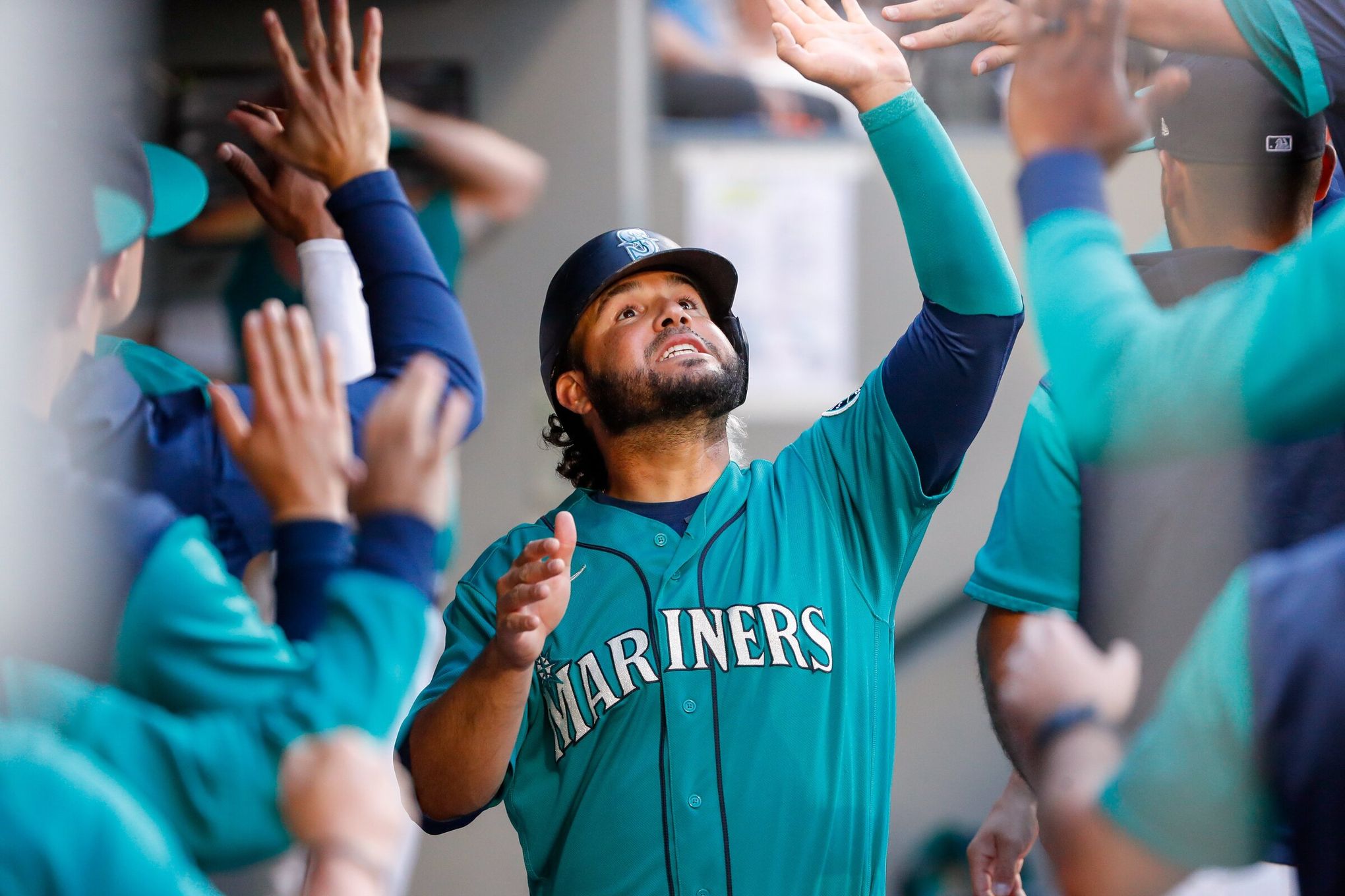 Seattle Mariner infielder Eugenio Suárez (28) rounds the bases and