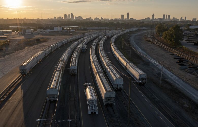 Freight train cars in Atlanta, Sept. 15, 2022. To defuse a labor dispute that brought the nation to the brink of a potentially catastrophic railroad strike, negotiators had to resolve a key issue: schedules that workers say were punishing, upending their personal lives and driving colleagues from the industry. (Dustin Chambers/The New York Times) 