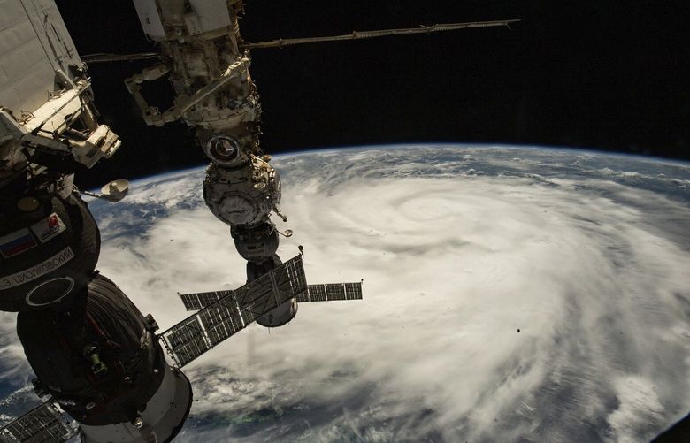 This satellite image provided by NASA shows Hurricane Ian pictured from the International Space Station just south of Cuba gaining strength and heading toward Florida.  Hurricane Ian rapidly intensified off Florida’s southwest coast Wednesday gaining top winds of 155 mph, just shy of the most dangerous Category 5 status. (NASA via AP) 