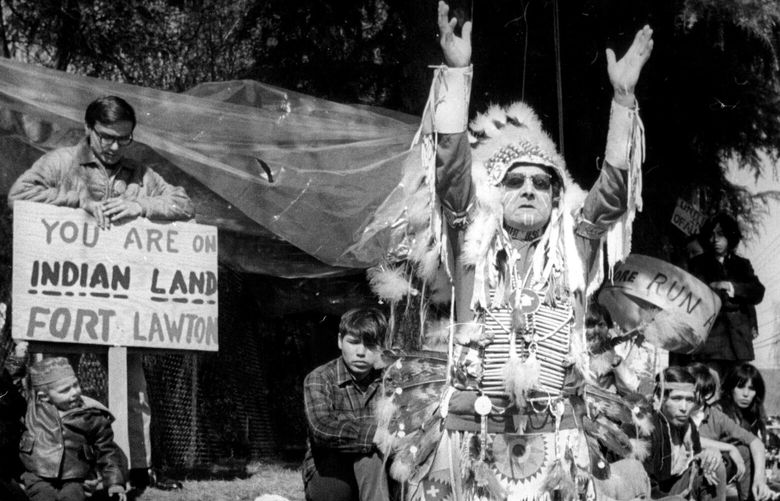 Indians Get Aid From White Buffalo ‰Û” Indian chief Frank (White Buffalo) Mann, a Hankpapa Sioux Indian, performs a sacred prayer Wednesday to protect the Indian demonstrators that claim Seattle’s Ft. Lawton. Mann, a grandson of Chief Sitting Bull, is from Little Eagle, S.D. Indians have been demanding Ft. Lawton be used as an Indian cultural and educational center. 1970
