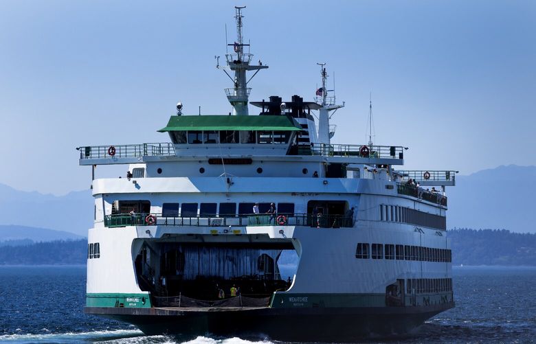 The Washington State ferry MV/Wenatchee departs Colman Dock, Wednesday, Aug. 17, 2022 in downtown Seattle, en route to Bainbridge Island.