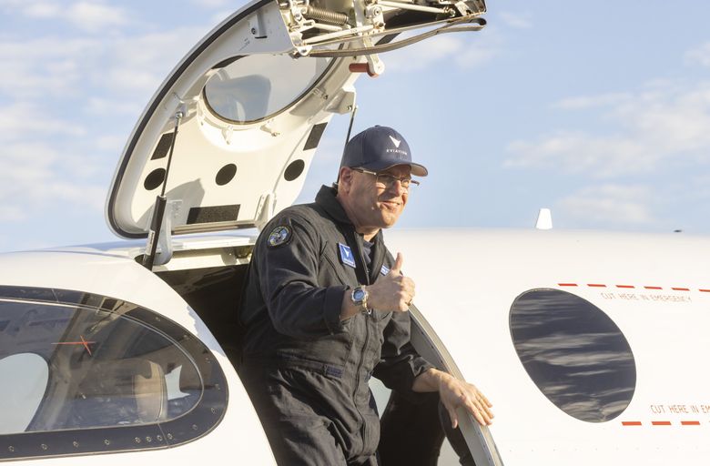 Test pilot Steve Crane gives a thumbs-up after the first flight of the all-electric airplane called Alice, designed and built in Arlington. (Ellen M. Banner / The Seattle Times)