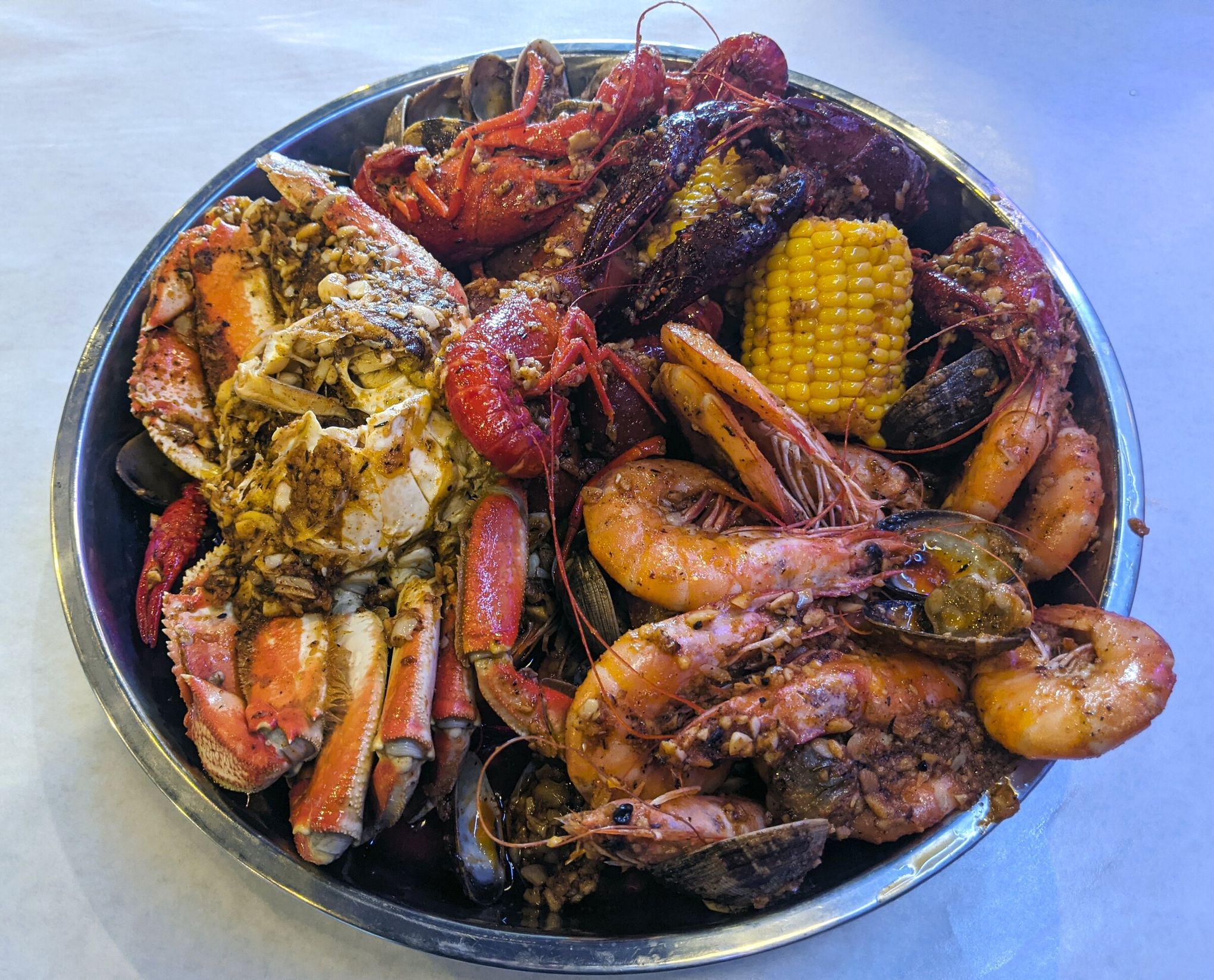 This Shoreline seafood boil will require both hands. It's worth