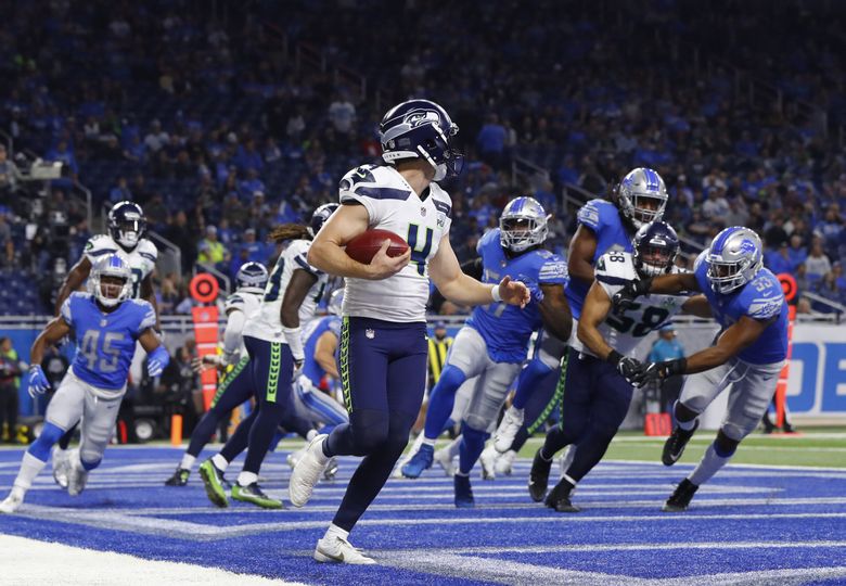 Seattle Seahawks punter Michael Dickson (4) plays against the