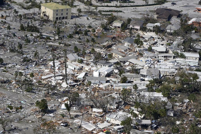 Damaged homes and debris are shown in the aftermath of Hurricane Ian on Thursday, Sept. 29, in Fort Myers Beach, Fla. (Wilfredo Lee / The Associated Press)