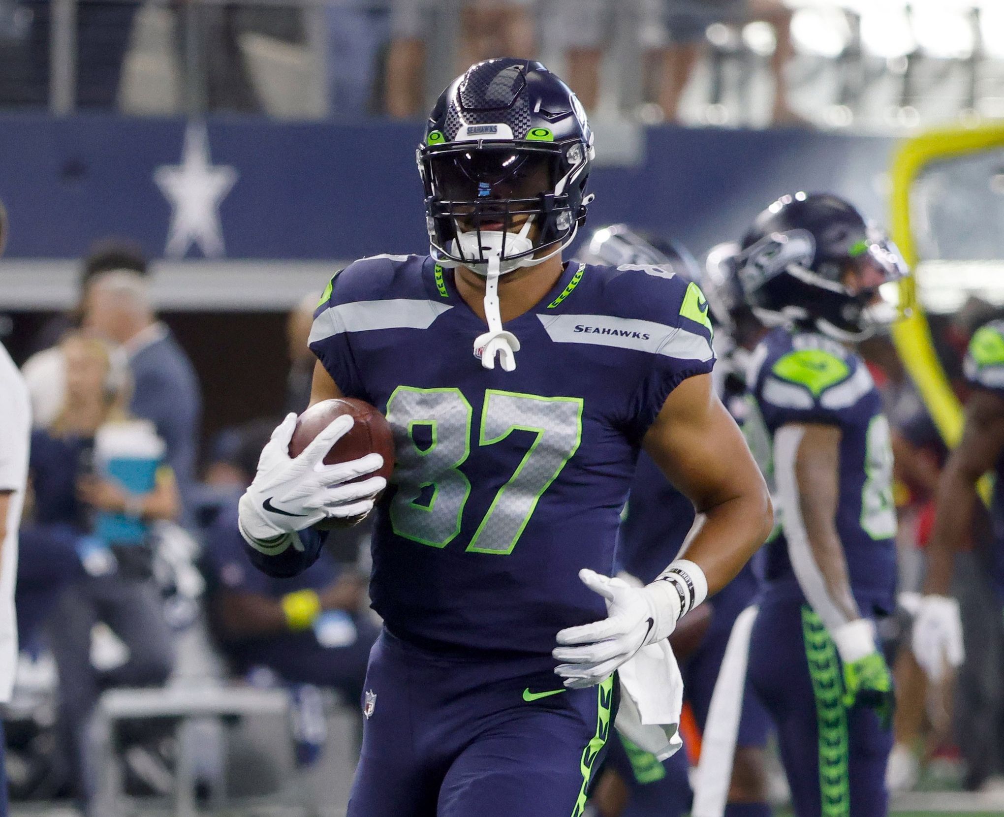 Seattle Seahawks defensive end Shelby Harris (93) runs onto the field  before an NFL football game against the New York Giants, Sunday, Oct. 30,  2022, in Seattle, WA. The Seahawks defeated the