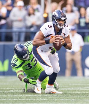 Reporter Bob Condotta grades the Seahawks' 48-45 win over the Lions