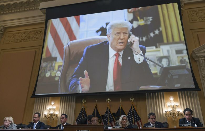 FILE – A screen displays a photo of former President Donald Trump during the third hearing of the House Select Committee investigating the Jan. 6 attack, at the Capitol in Washington, June 16, 2022. The committee will hold its first hearing since July on Wednesday, Sept. 28, entering the final stage of its inquiry. (Kenny Holston/The New York Times)